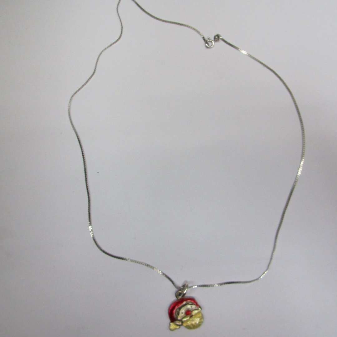 Santa Claus pendant on a silver chain